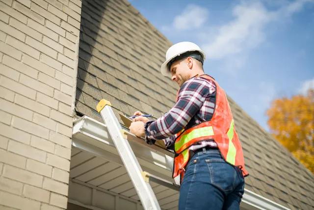 Professional roof inspection being performed on a residential home in Braselton, GA