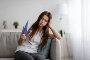 Woman feeling summer humidity